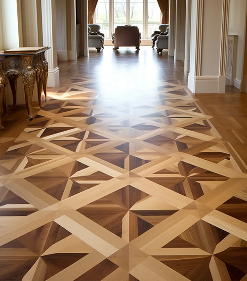 Custom geometric parquet hardwood floor leading into a sunlit hall