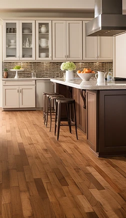Hand-scraped hardwood flooring repaired to a seamless finish in a kitchen